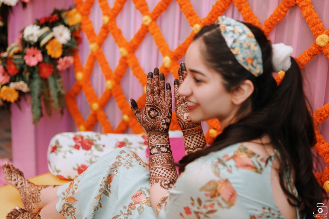 Bride embracing the elegance of Mehndi function, with a soft khol smudge, a  touch of subtle blush, and a simple, floral hairstyle✨🪞#... | Instagram